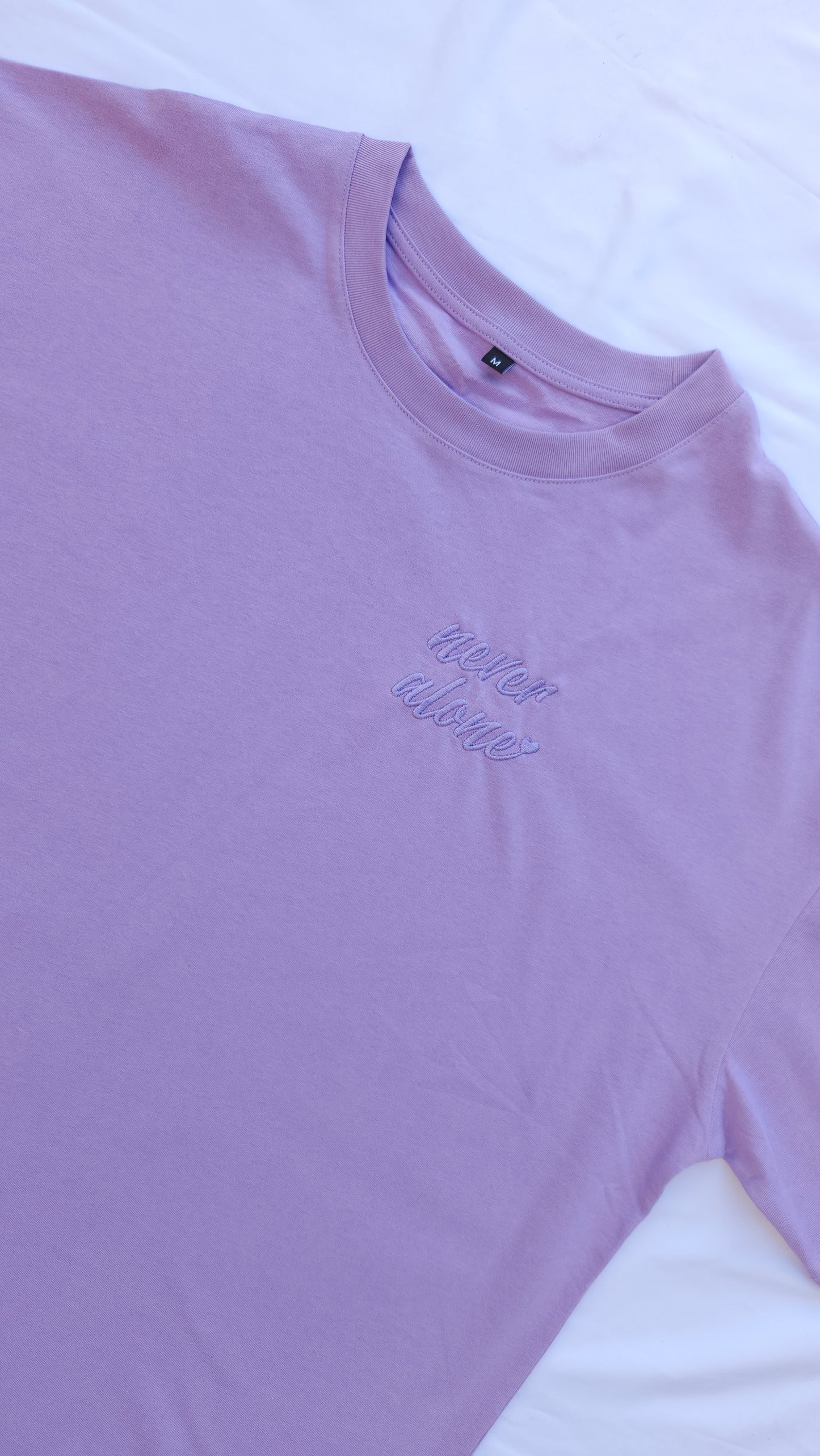 'Never Alone' Embroidered Oversized T-Shirt